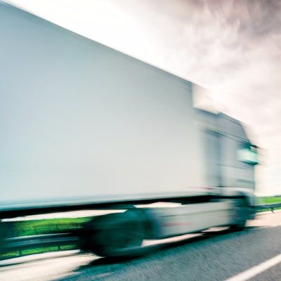 Truck driving past on a highway