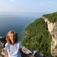 Xplore customer Polly C with a scenic background