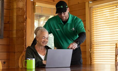 Xplore Technician Helping Customer During Install