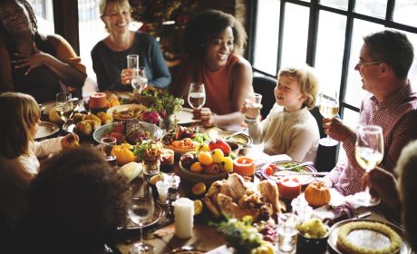 Family sitting at the table for a holiday dinner