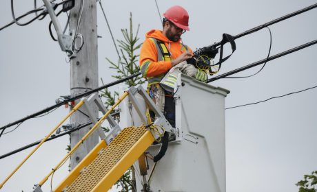 Man working on fibre lines in Quebec to bring faster Internet