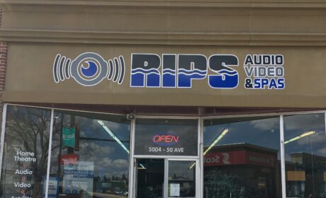 Authorized Xplore Dealer, Rips Audio Video's store front in Old's Alberta. The big blue sign says "Rips".
