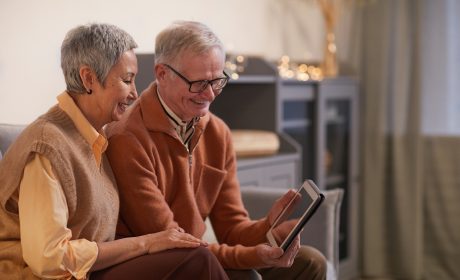 A senior couple using a tablet with fast Internet in Canada