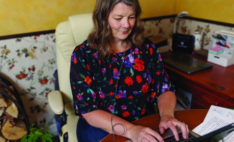 An Xplore customer working from home on their laptop