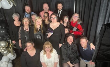 A group photo taken from above of the Xplore Customer Care team at the Contact NB Awards.