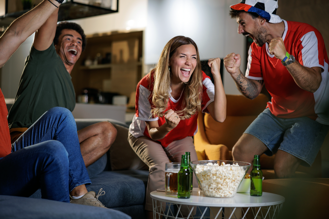FRIENDS WATCHING SPORTS