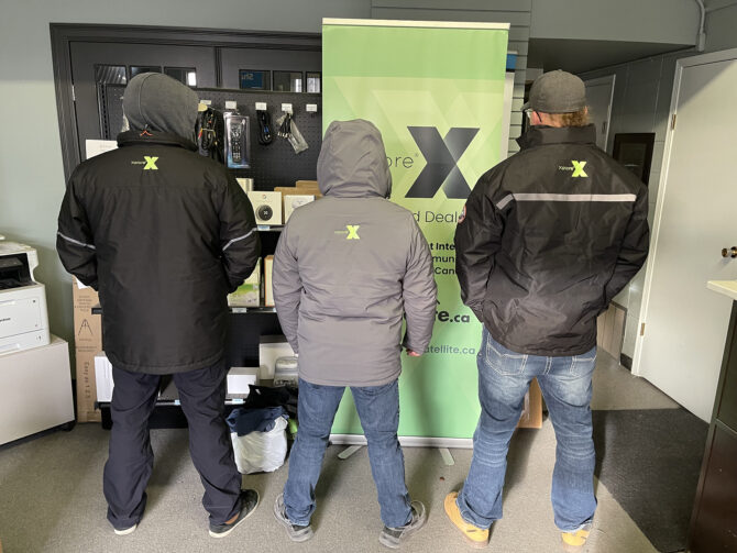 The team from Xplore Dealer, LA Satellite showing off their branded jackets.