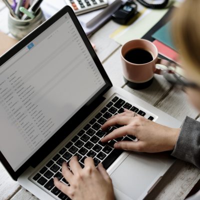 Person typing on a laptop