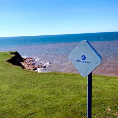 Photograph of an Xplore Access Point mountain edge by the ocean by Dylan Murchison