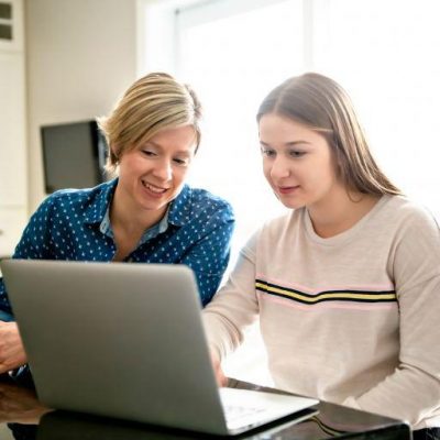 Mother & daughter using a laptop