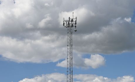 A photo of the top of the Malmo tower against a partly cloudy sky.