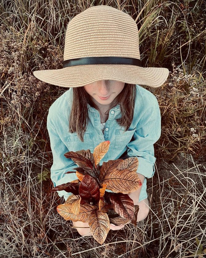 Dianne Craswell holding leaves