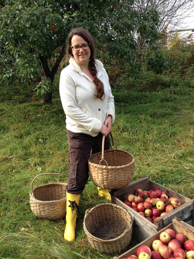 Dina picking apples