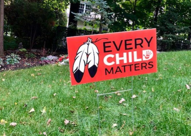 Every Child Matters lawn sign