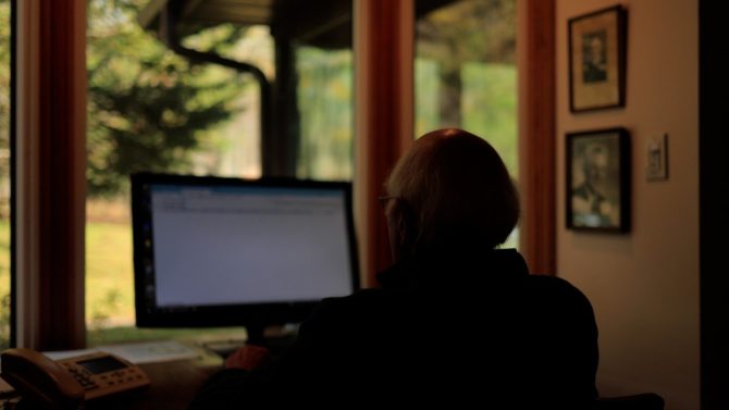 John using the computer