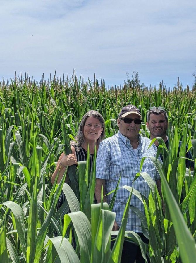 Family in corn field