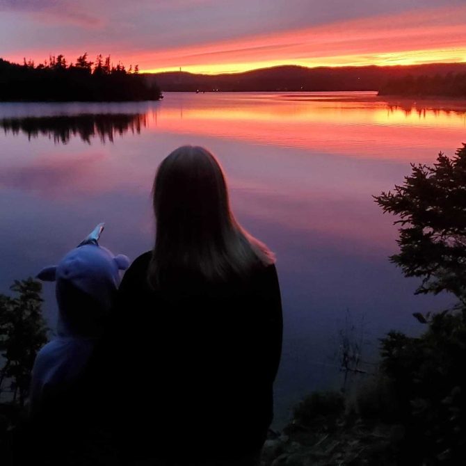 Sunset looking out onto a lake